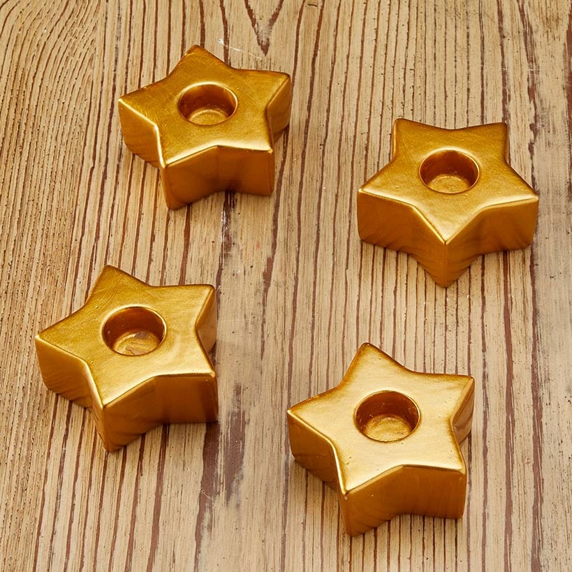 Set of 4 Star-Shaped Gold Taper Candleholders